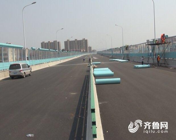 济南二环西路一期月底通车 高温下的建设者：热并快乐着