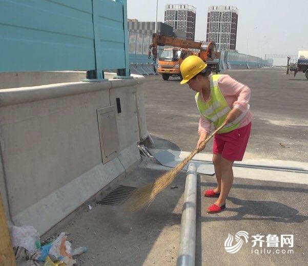 济南二环西路一期月底通车 高温下的建设者：热并快乐着