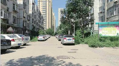 金龙公寓东侧土地纠纷待破解 开发商两次进场难开工