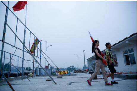 济宁退伍女兵老家开店卖早餐 坚持每天升国旗