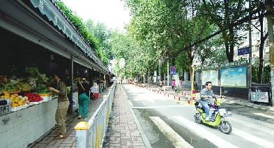 街头变迁见证创城 济南岔路街道路畅通便民市场整洁有序