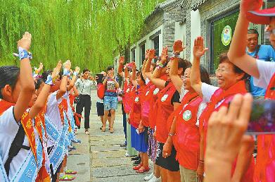 【创城新变化】聚小爱 传大爱 旅游啄木鸟：啄出一片文明天空