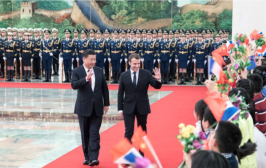 习近平同法国总统马克龙举行会谈 两国元首一致同意推动紧密持久的中法全面战略伙伴关系行稳致远