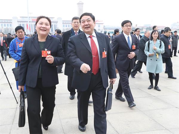 图说：满面春风赴盛会