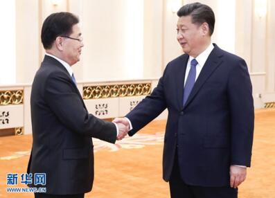 习近平会见韩国总统特使郑义溶