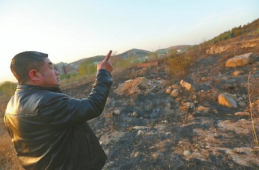 疑烧纸引燃荒草百余人上山扑救 事发104国道岳而庄附近