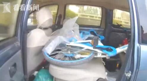 司机拉共享单车回老家 高速交警拦下面包车竟装一辆共享单车