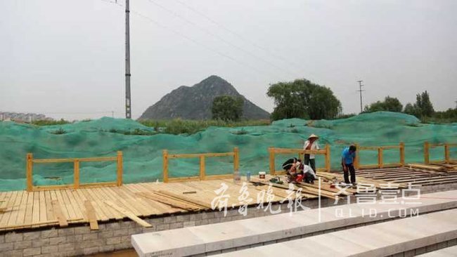 华山湿地公园园林一期完成近半 三圈环湖路已现雏形