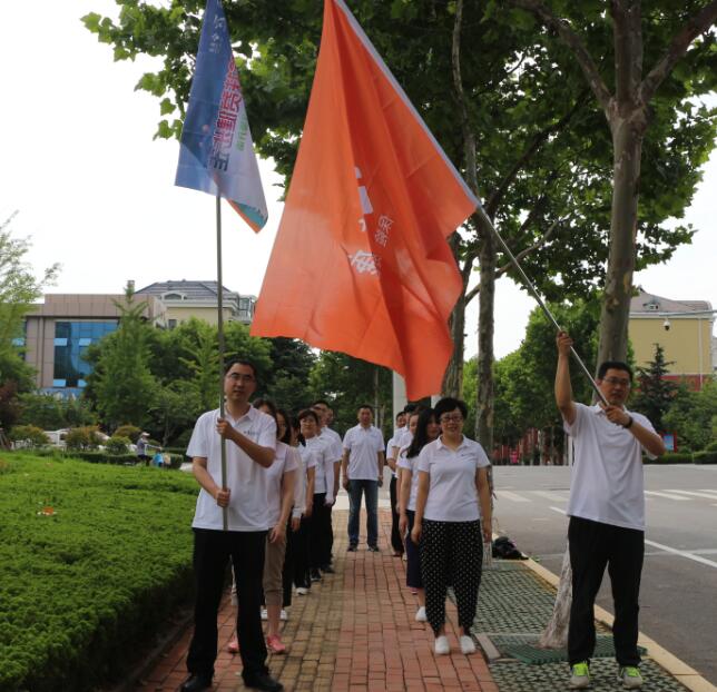 泰康人寿日照中支举办“7.8保险扶贫健步走”活动