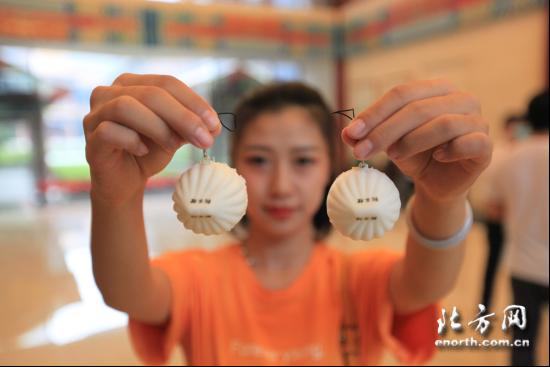 小包子大学问 天津名吃“狗不理”打开采风团味蕾