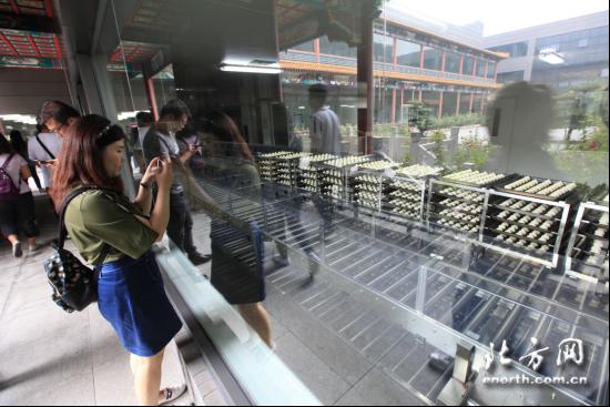 小包子大学问 天津名吃“狗不理”打开采风团味蕾