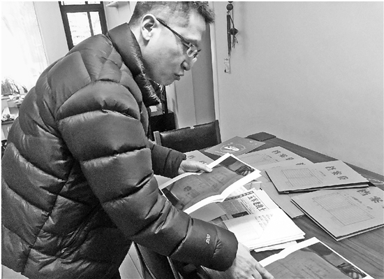 陈杰在整理以往的案例。