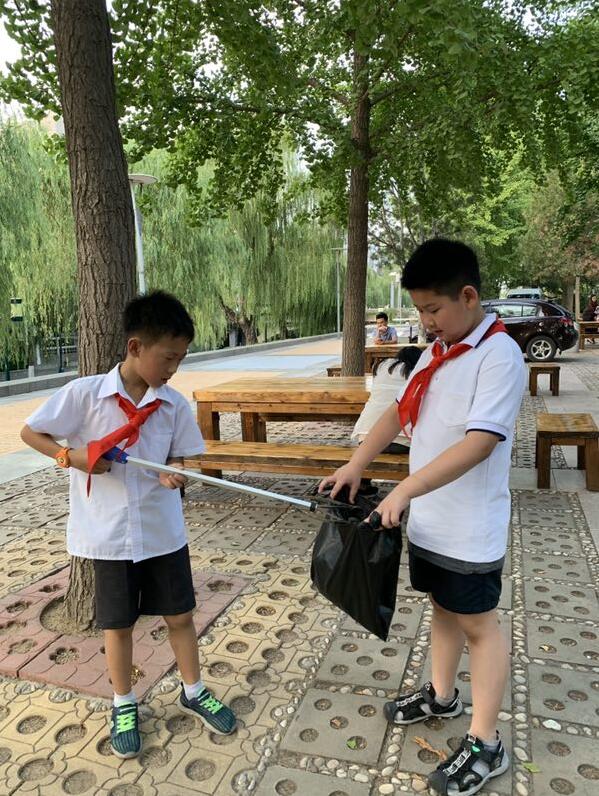 共筑碧水蓝天，小小义工在行动