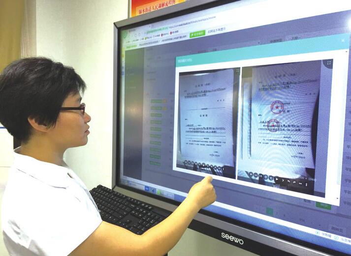 村里有了“盖章机”证明一趟就办好