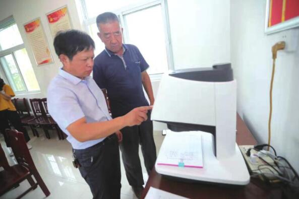 村里有了“盖章机”证明一趟就办好