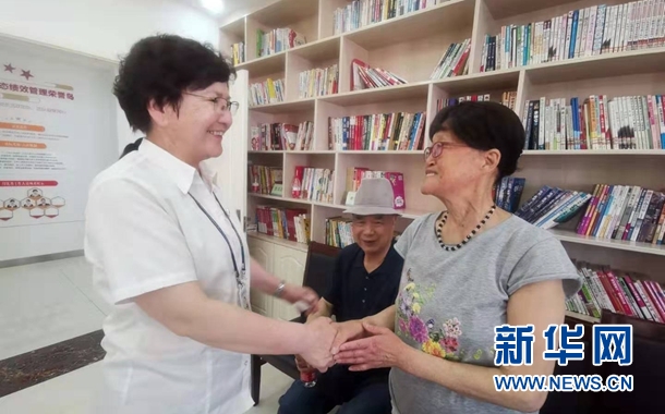 【边疆党旗红】基层社区党组织成轴心 新疆模范党员成群众贴心人