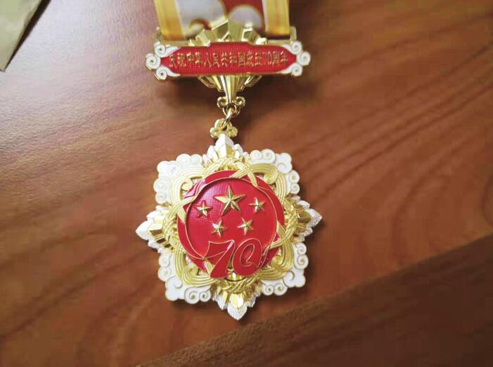 济报独家·带您领略纪念章风采:五星代表国家荣誉!