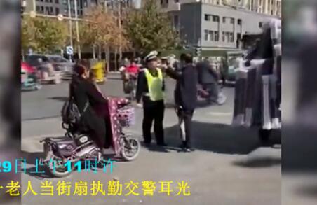 忍无可忍!老人闯红灯被阻扇交警耳光 嚣张戾气让网友怒骂