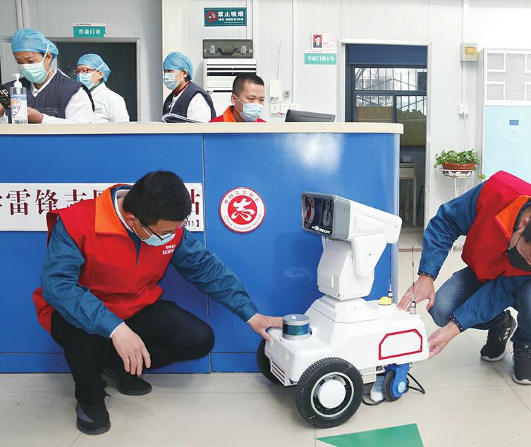 守护传染病医院50余天 机器人“测温员”又快又准