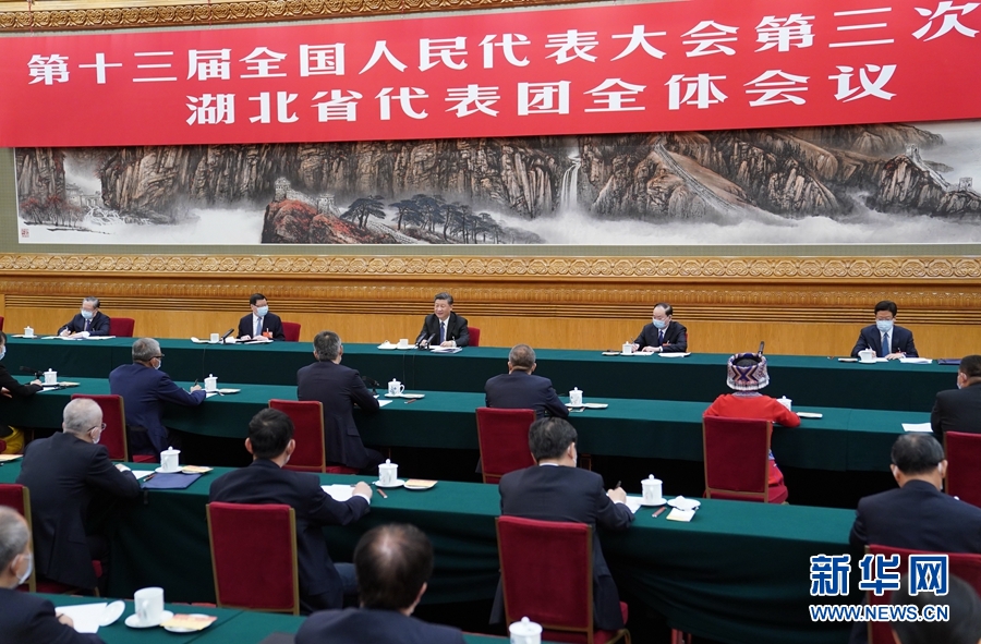 战“疫”时刻,习近平的10个暖人瞬间