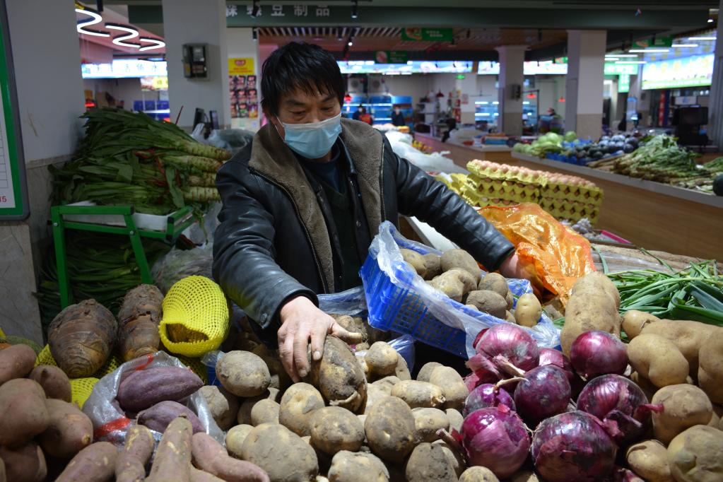 新华全媒+丨疫情防控下，一颗土豆的“进城之旅”