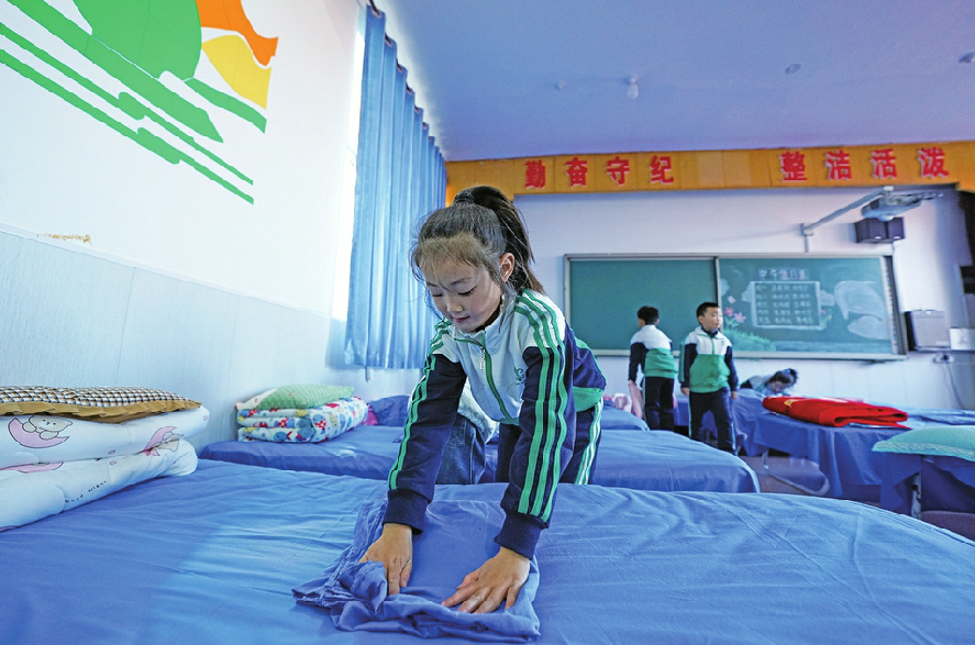 多地中小学开启校内午休模式 大规模推广仍存现实困难