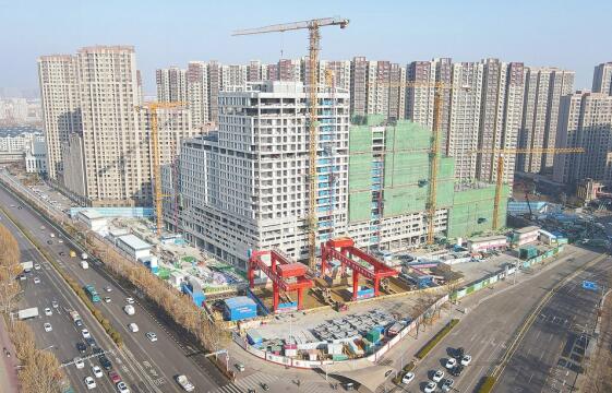 Fin de la construction de la structure principale du premier grand projet TOD dans ancien port commercial à Jinan
