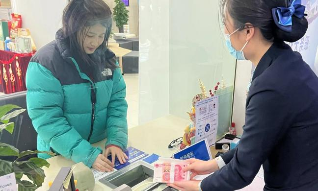 民生银行临沂分行开展“换新钞 过大年”暖心为民金融服务活动