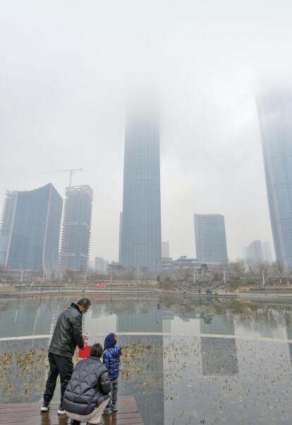 High-rise Buildings in Rain Soar to Sky