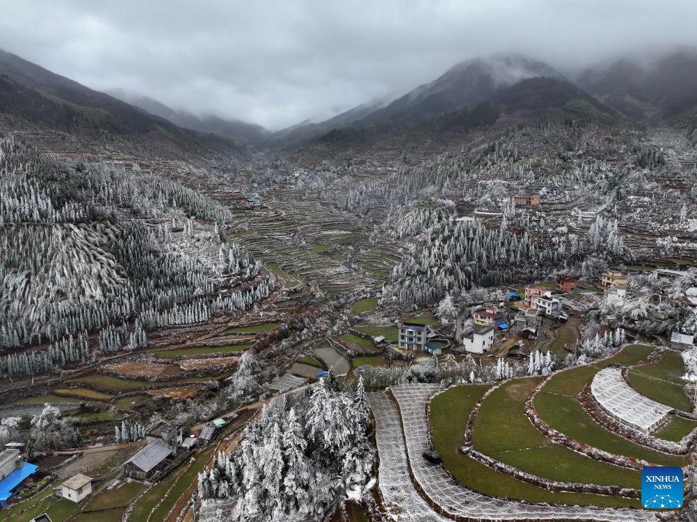 Снежные пейзажи террас в деревне Даюань на юге Китая