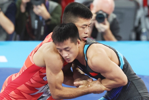曹利国摘男子古典式60公斤级银牌 追平中国男跤最好成绩
