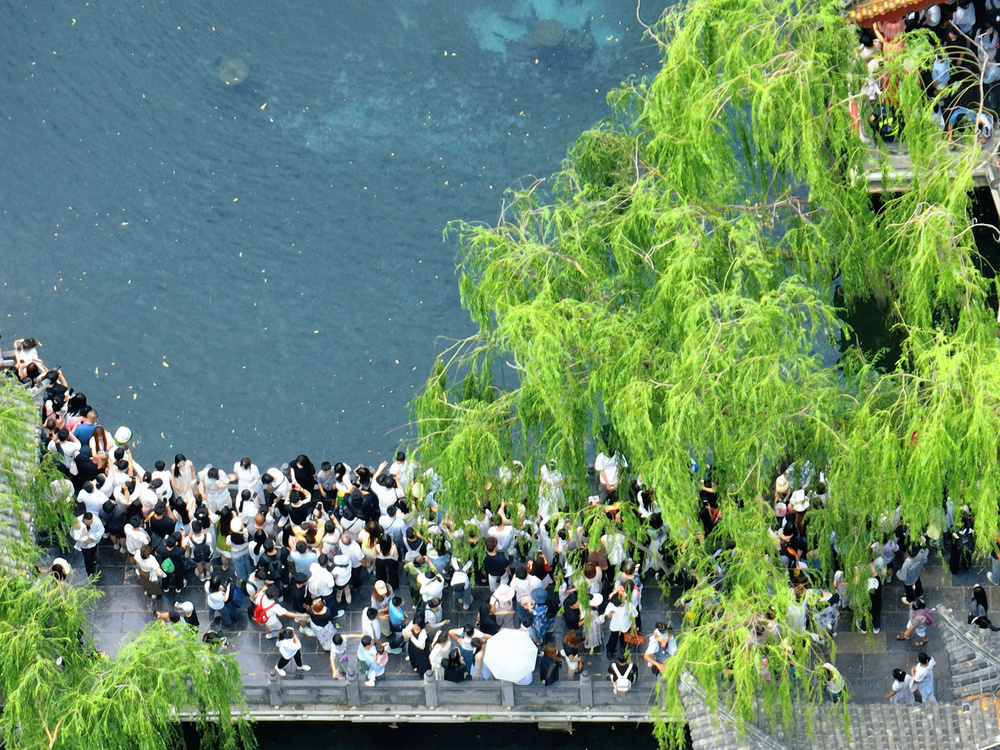 “两头热 中间凉”本周晴雨天气交替上演