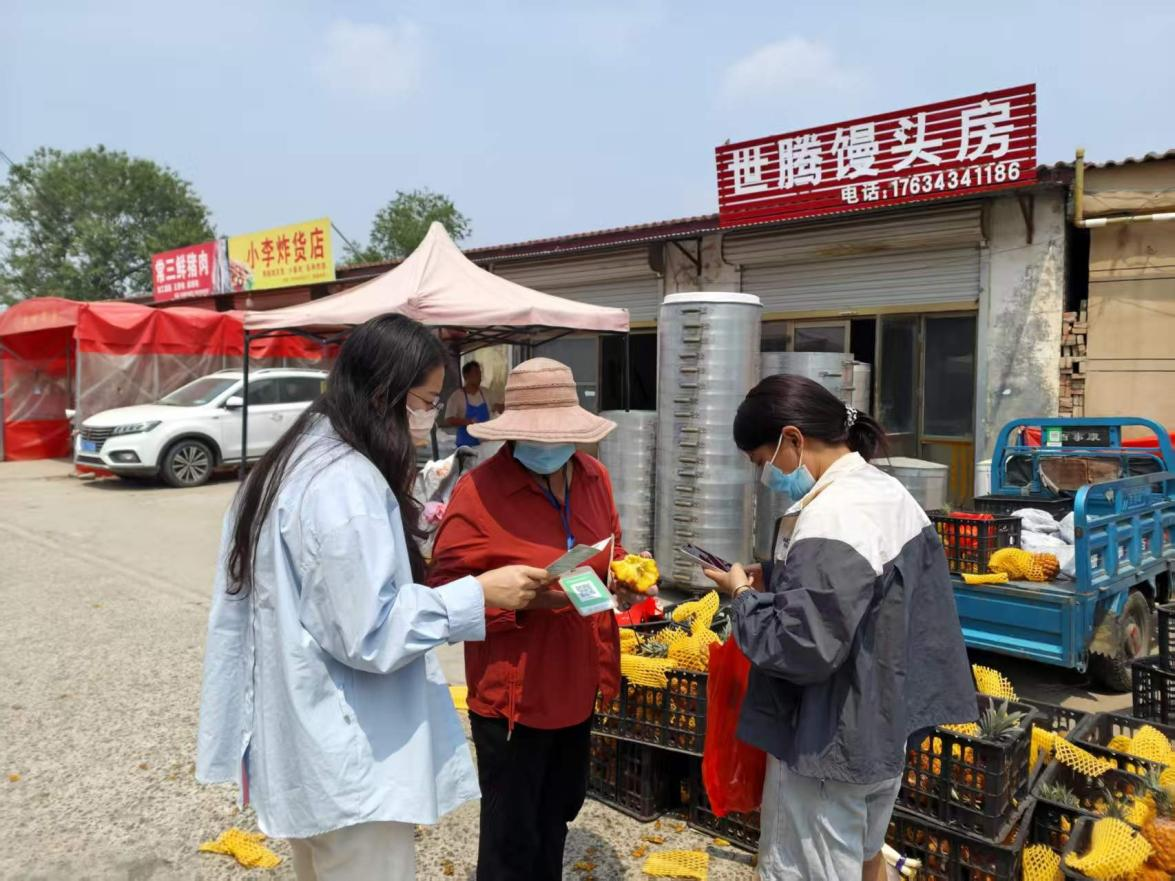 平安产险巨野支公司：集市普法“接地气”，筑牢防诈“防火墙”